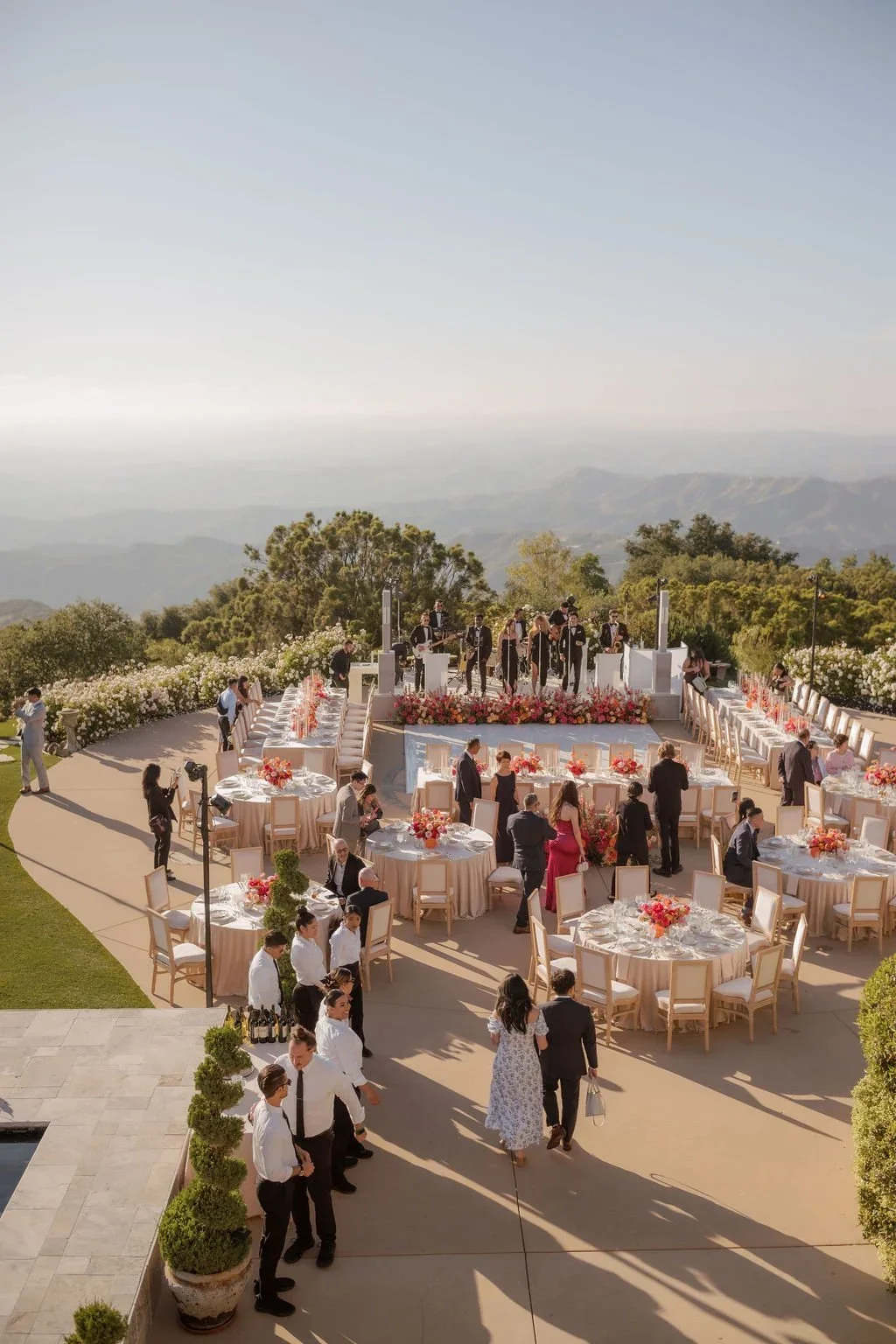 A panoramic view across the outdoor reception in the mountains.