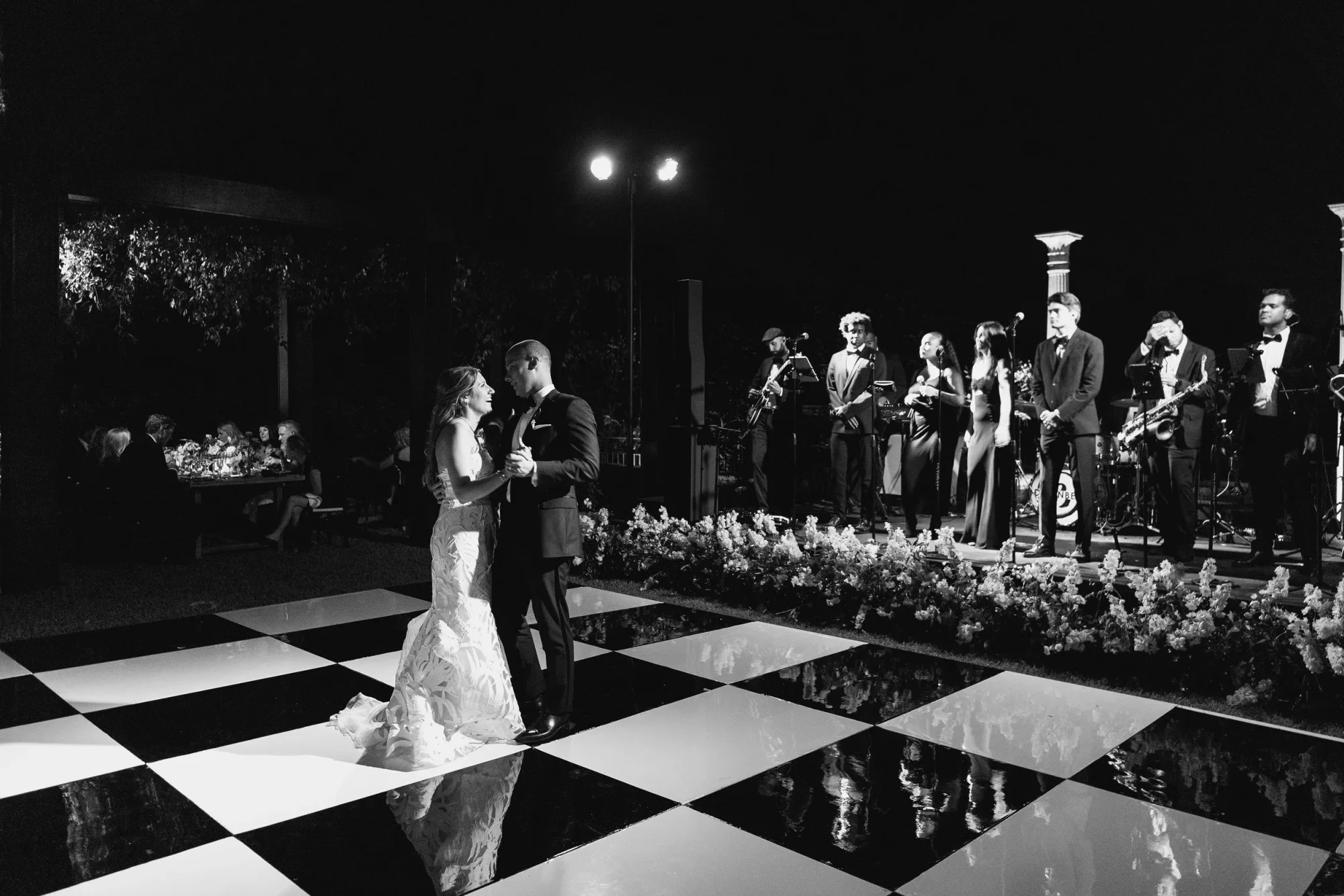 A wide black and white view of the mirrored dance floor.