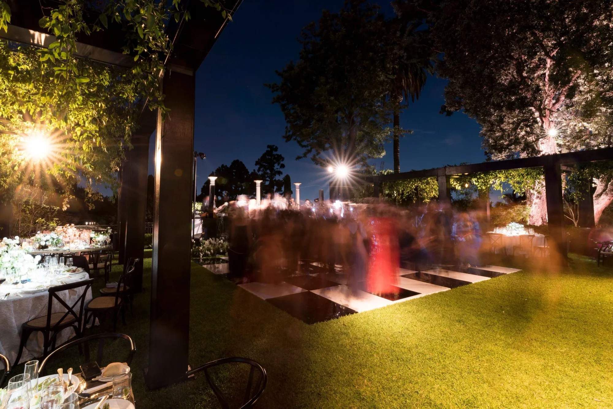 The mirrored dance floor glowing after dark.