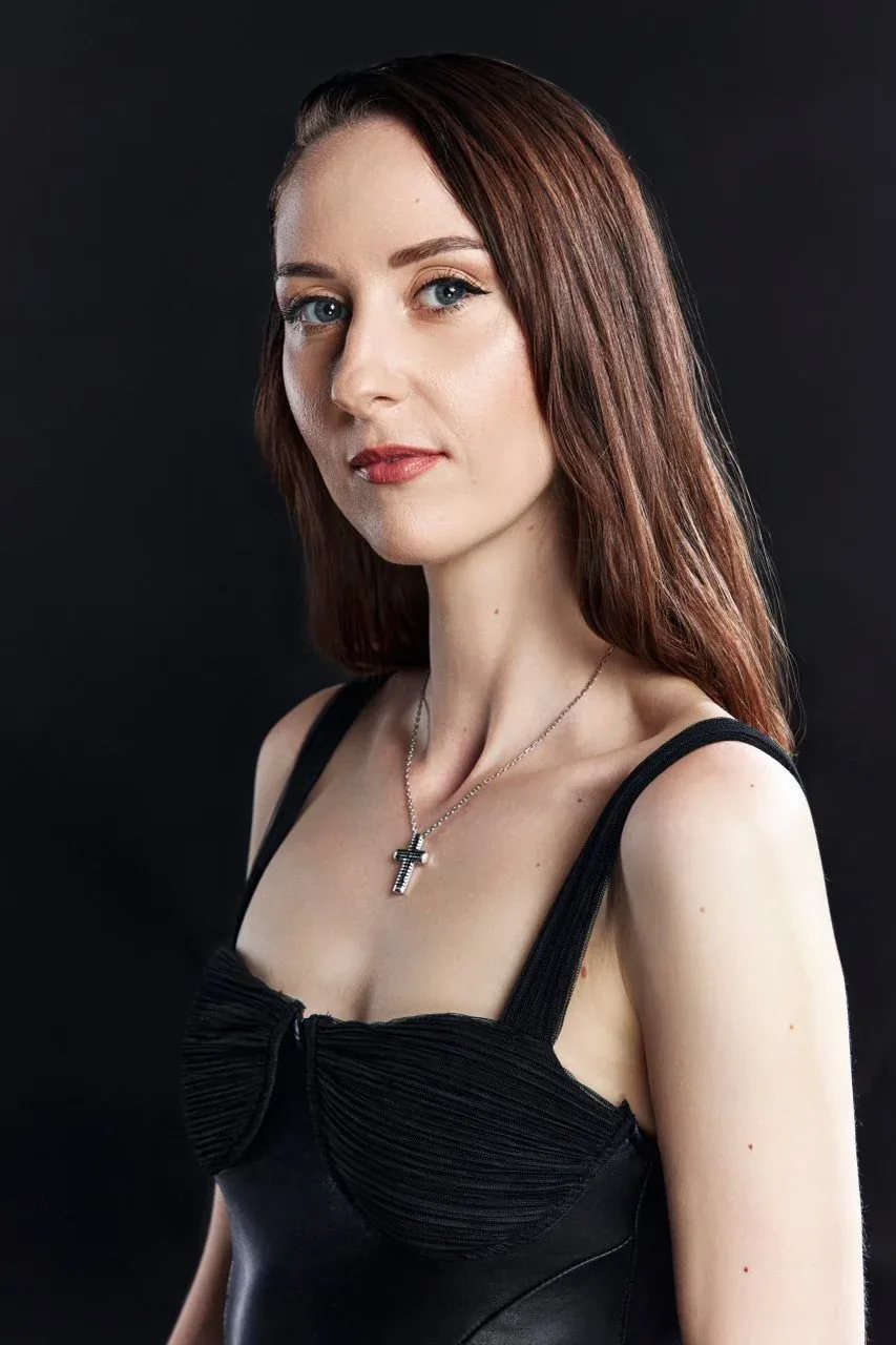 DJ Lilia in a studio portrait.